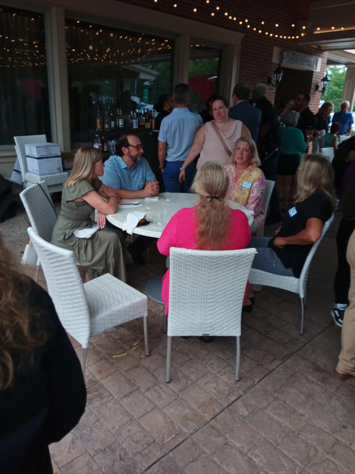 quality contacts members on a table in a discussion