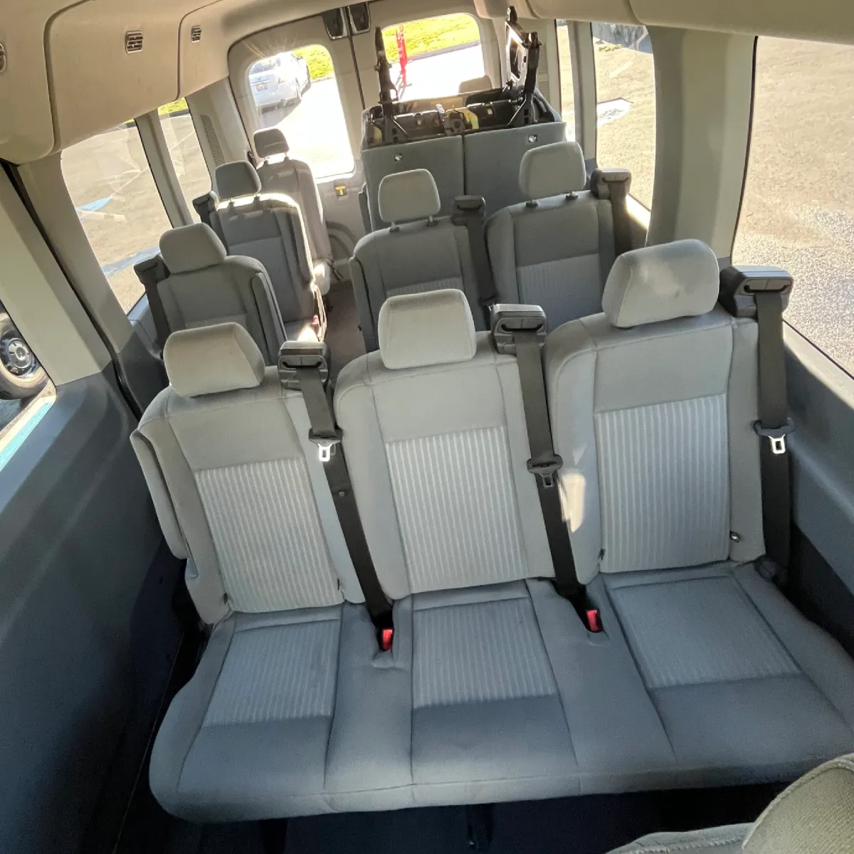 Detailed minivan interior with clean beige leather seats