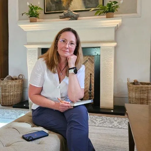 Woman reading Kindle in bed