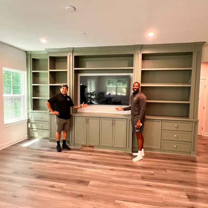 "Custom built-in shelving with elegant design and seamless integration into home interior."