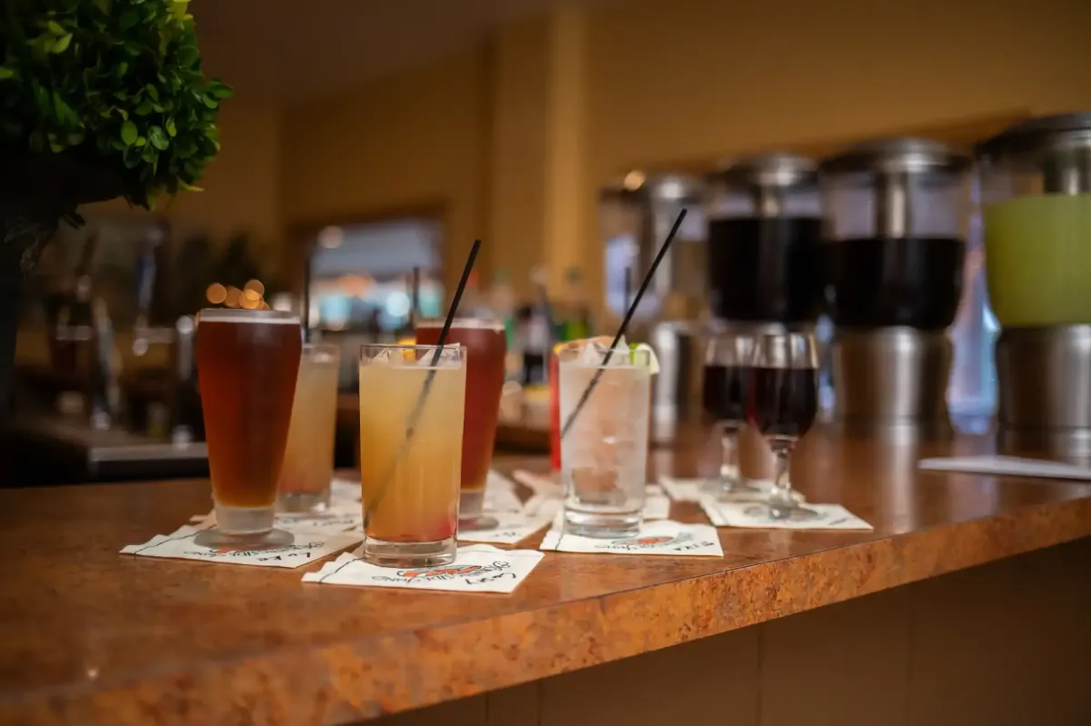 Wedding reception dinner with drinks at the bar