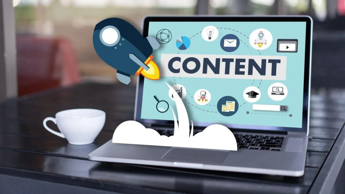 Image showcasing a laptop with 'content' displayed, surrounded by social media and graph icons, a launching rocket, and a coffee cup, representing a dynamic content strategy and growth.