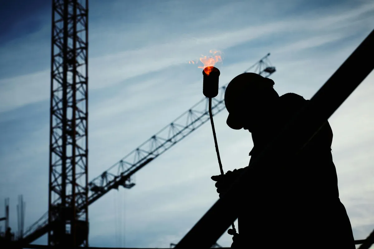 sillhouette of a worker stock image
