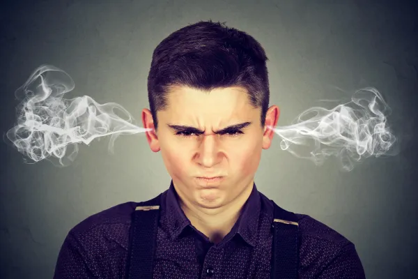 Angry man with steam coming from his ears