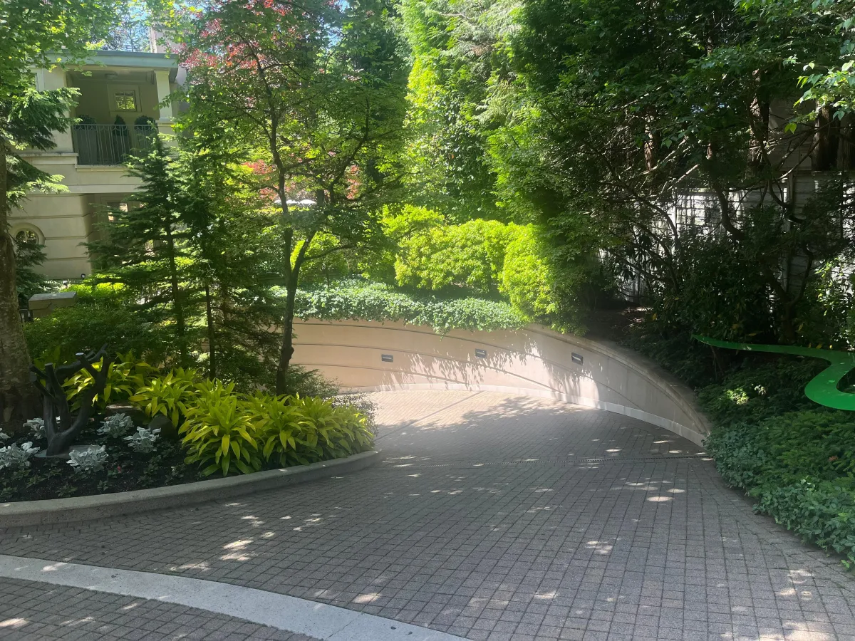 Trident Cyclone Matte Sealer applied to modern interlock driveway – natural finish