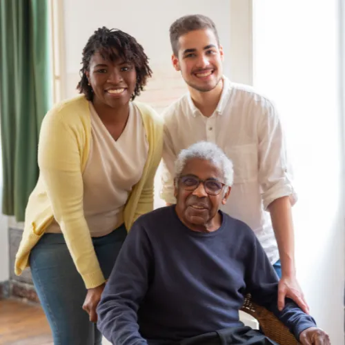 An Elder with their 2 Child smiling in the picture