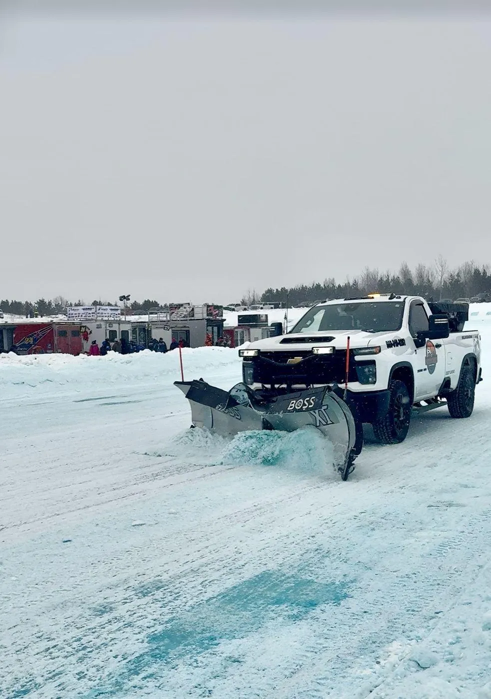 Landworks snowplow clearing a path