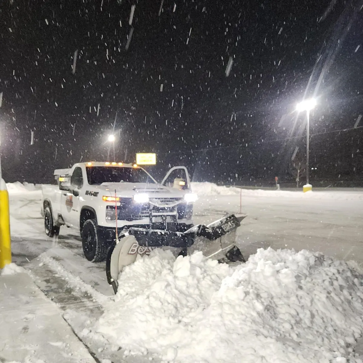 Landworks snowplow hard at work clearing snow