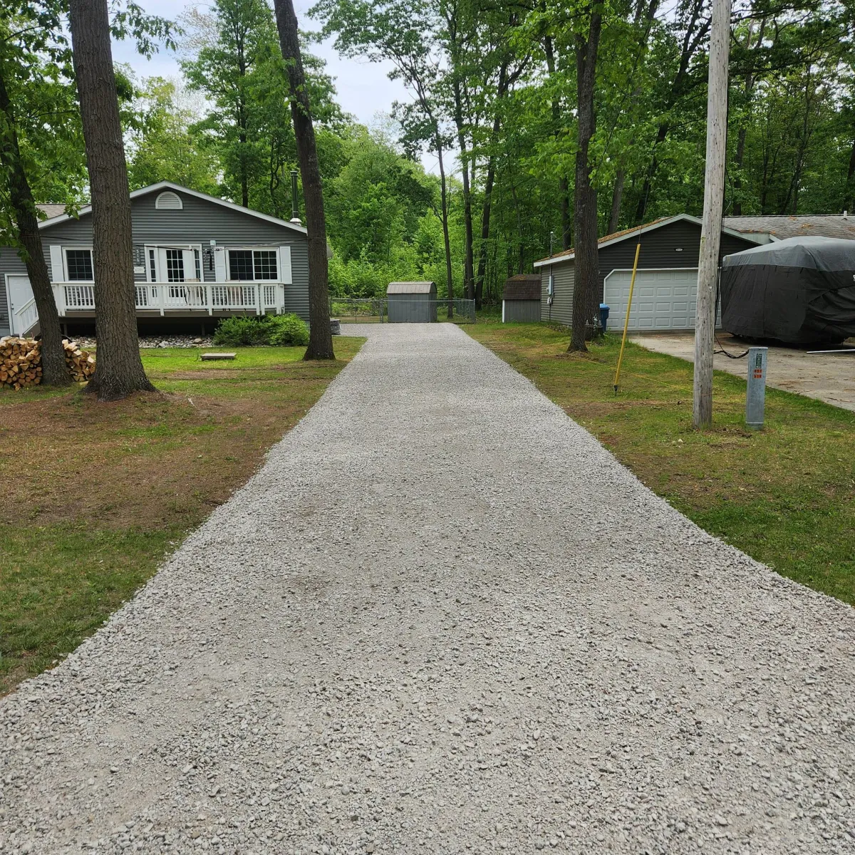 A fresh limestone driveway implemented by Landworks