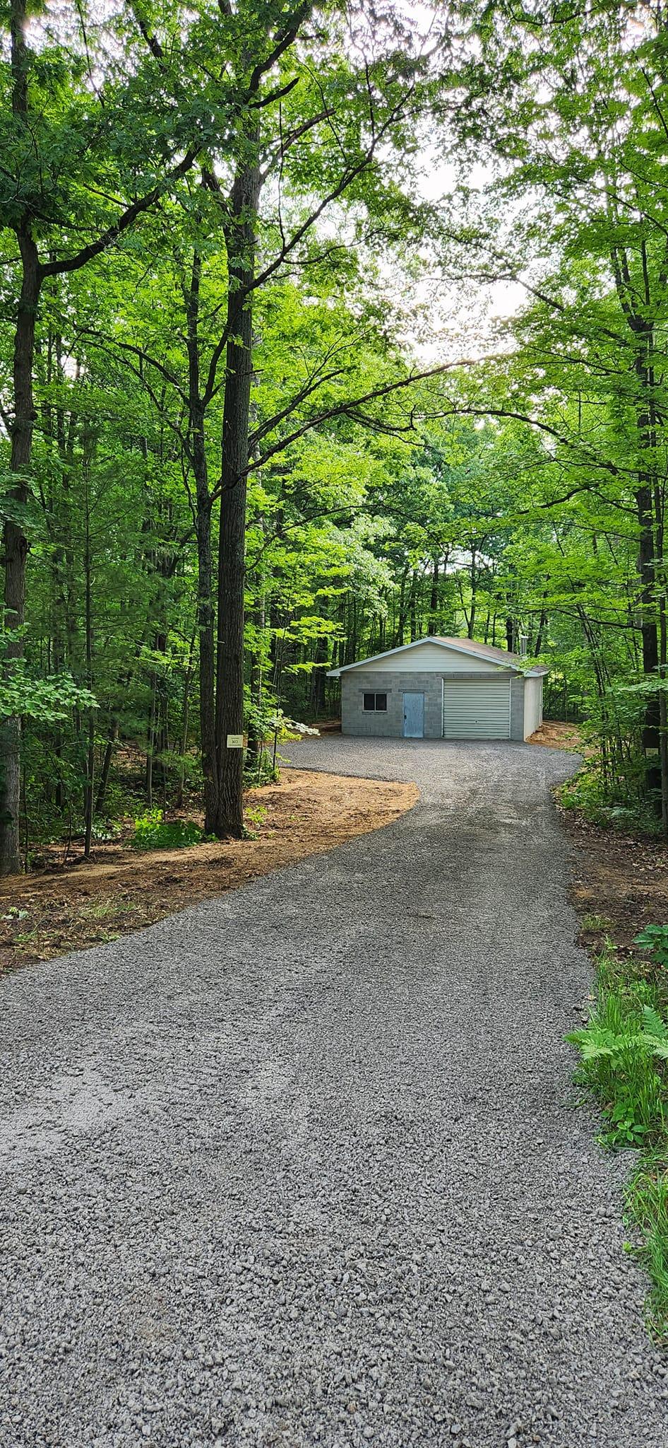 A beautiful end result of the rough and overgrown driveway