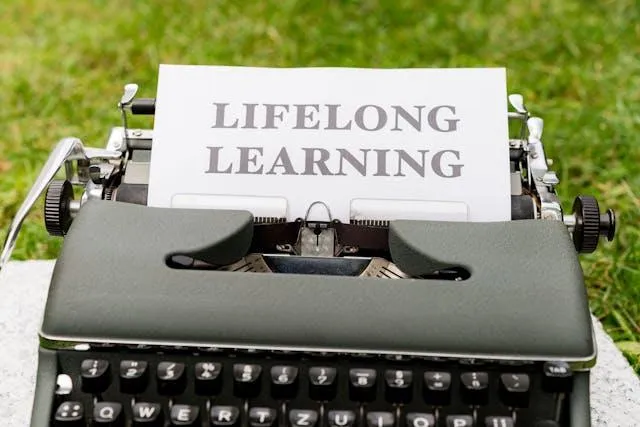 typewriter with lifelong learning sign