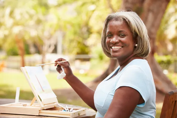 Black woman painting.