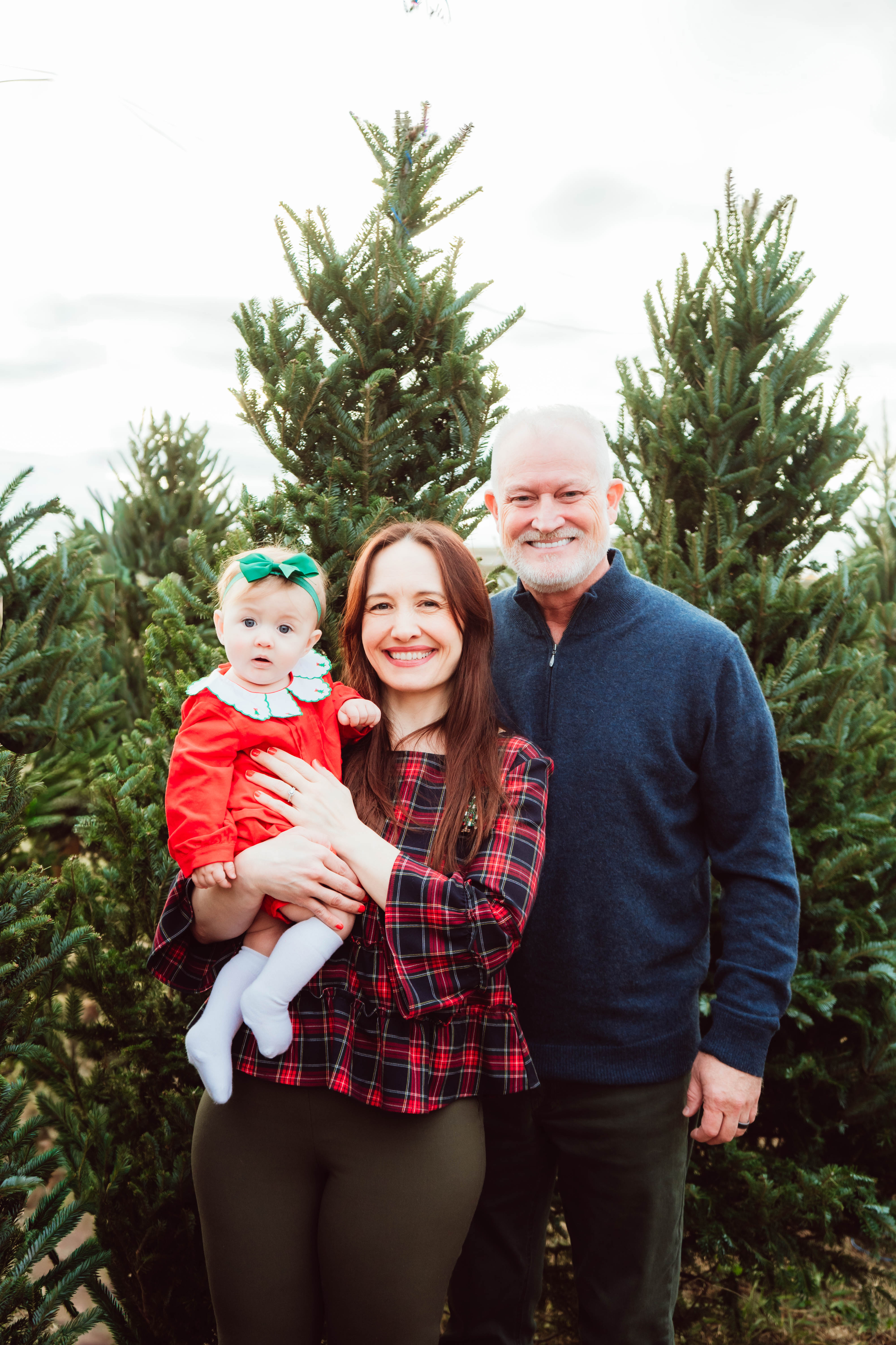 Small group gathered in prayer in a quiet coffee shop setting