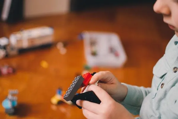 Boy Playing Lego