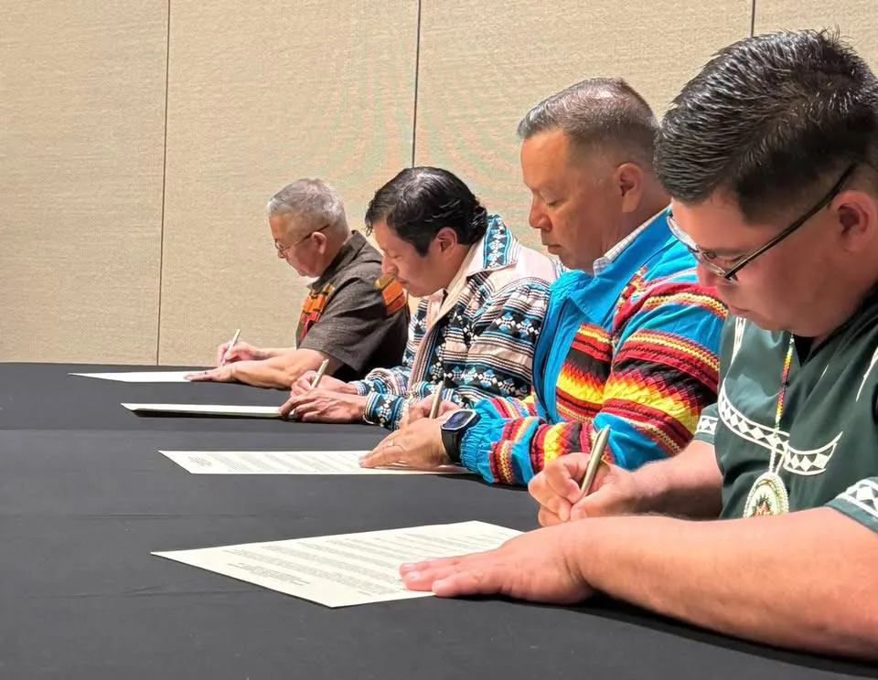 Leaders from the Eastern Band of Cherokee Indians and fellow USET founding tribes sign the Accord Agreement on the Qualla Boundary, renewing their pledge to unity and tribal sovereignty.