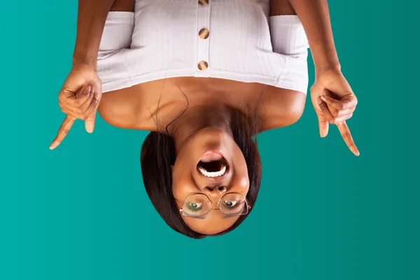 Stressed woman upside down