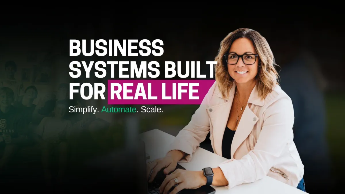 Eleven smiling teenage boys gathered inside a living room, some sitting on a couch and others standing behind it, posing playfully for the camera.