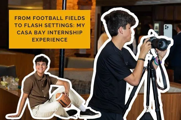 Peyton, Casa Bay Photography intern, capturing candid shots at a Real Producers networking event during summer internship.