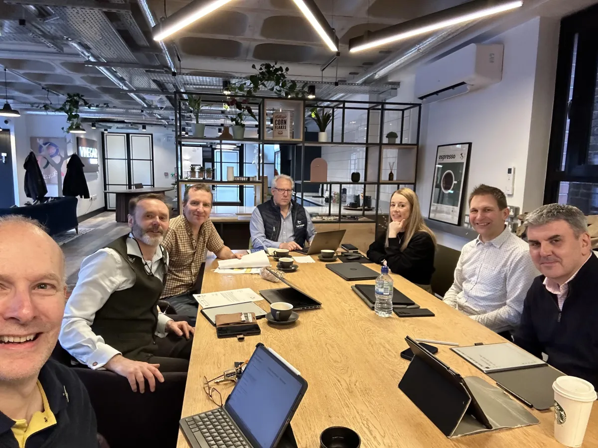 business people at a table collaborating
