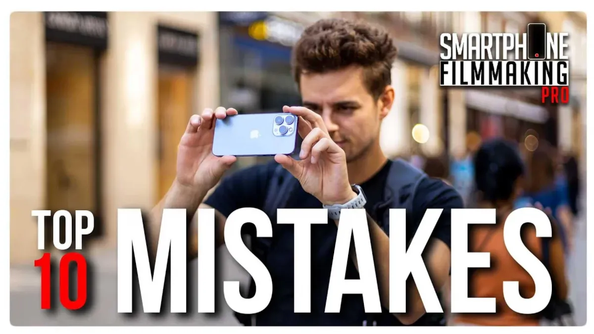 Guy filming with a smartphone