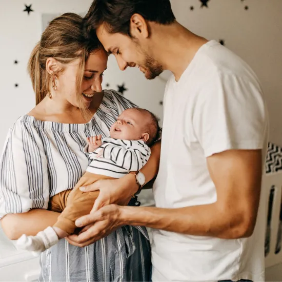 Happy parents with their infant