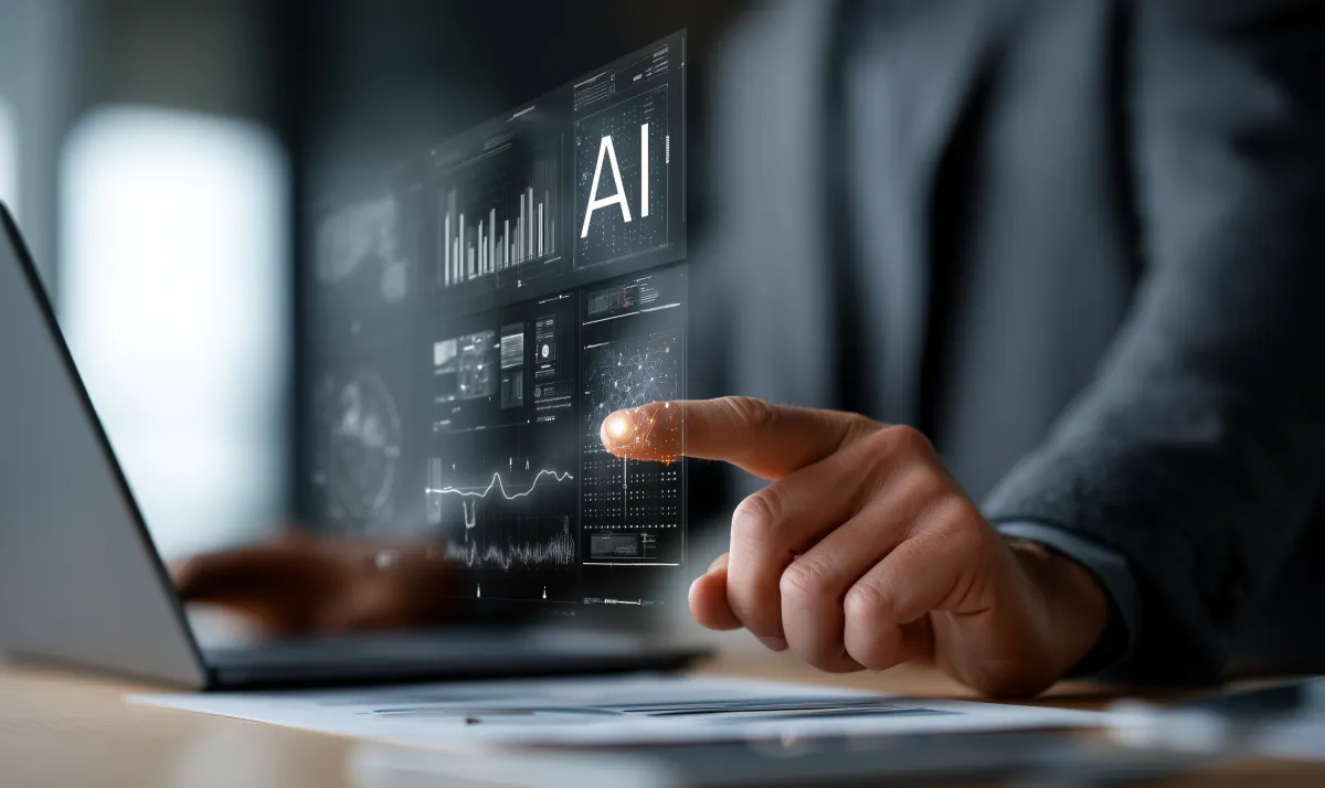 Business professional in a dark suit interacting with a futuristic AI interface displaying analytics and data visualizations on a transparent digital screen.