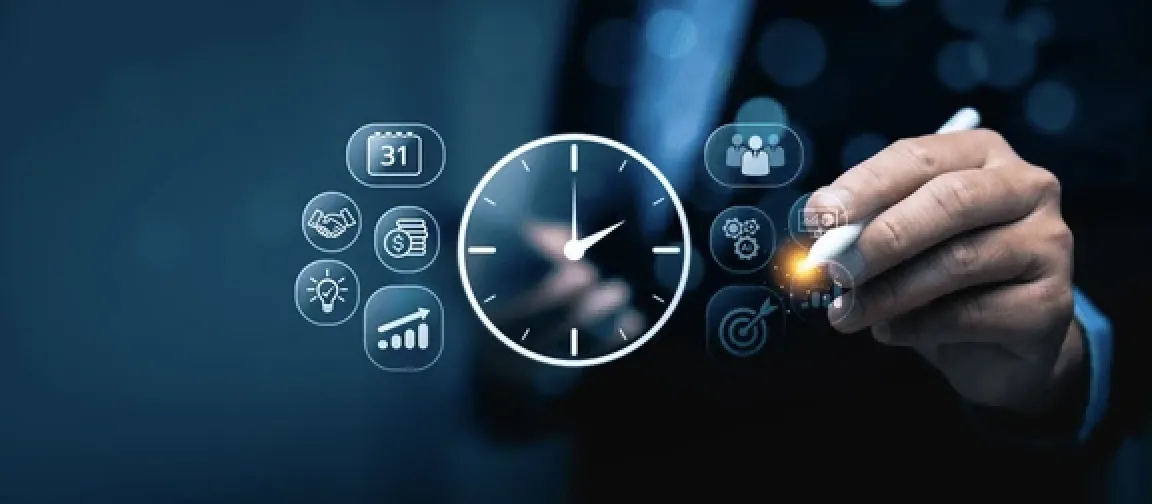 clock in front of laptop