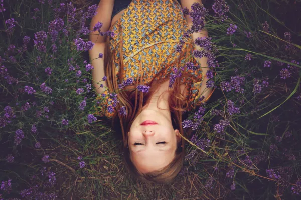 Woman Lying In Flowers