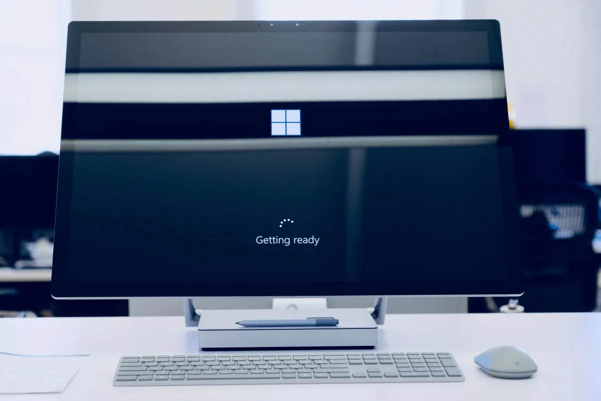 Person typing on a computer.
