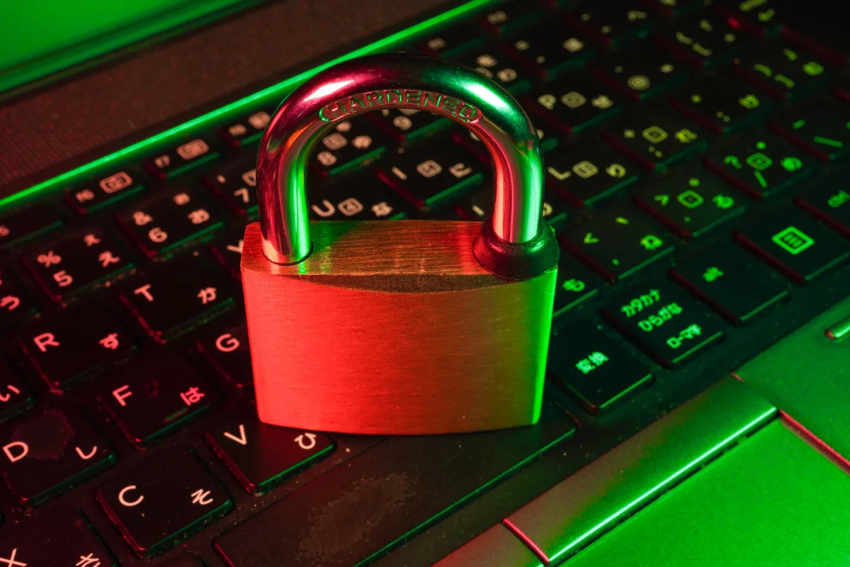 A lock sitting on a keyboard.
