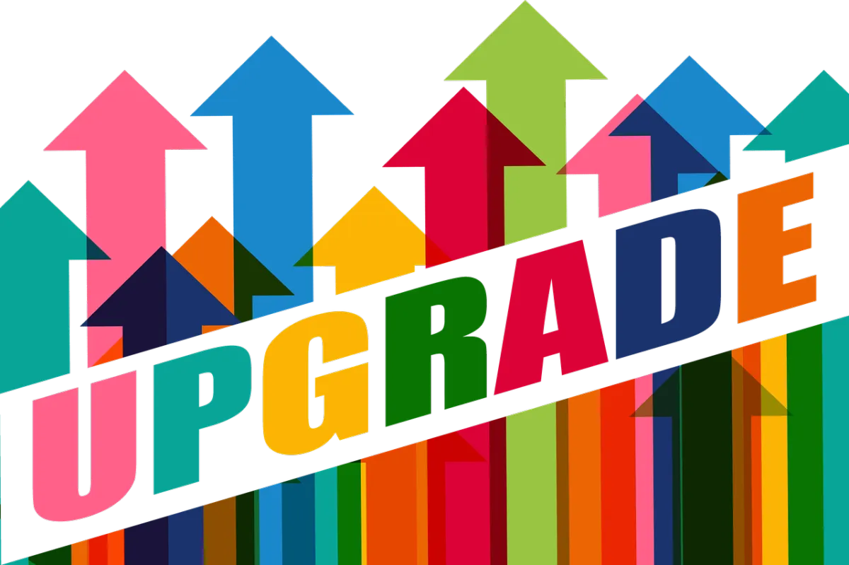 The word "UPGRADE" with a bunch of different coloured arrows pointing up behind it.