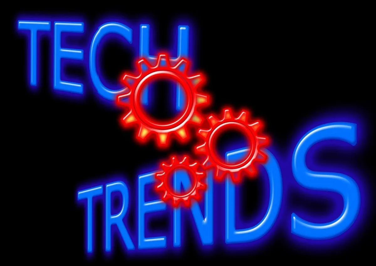 "TECH TRENDS" in blue with three red cogs in the middle of the image.