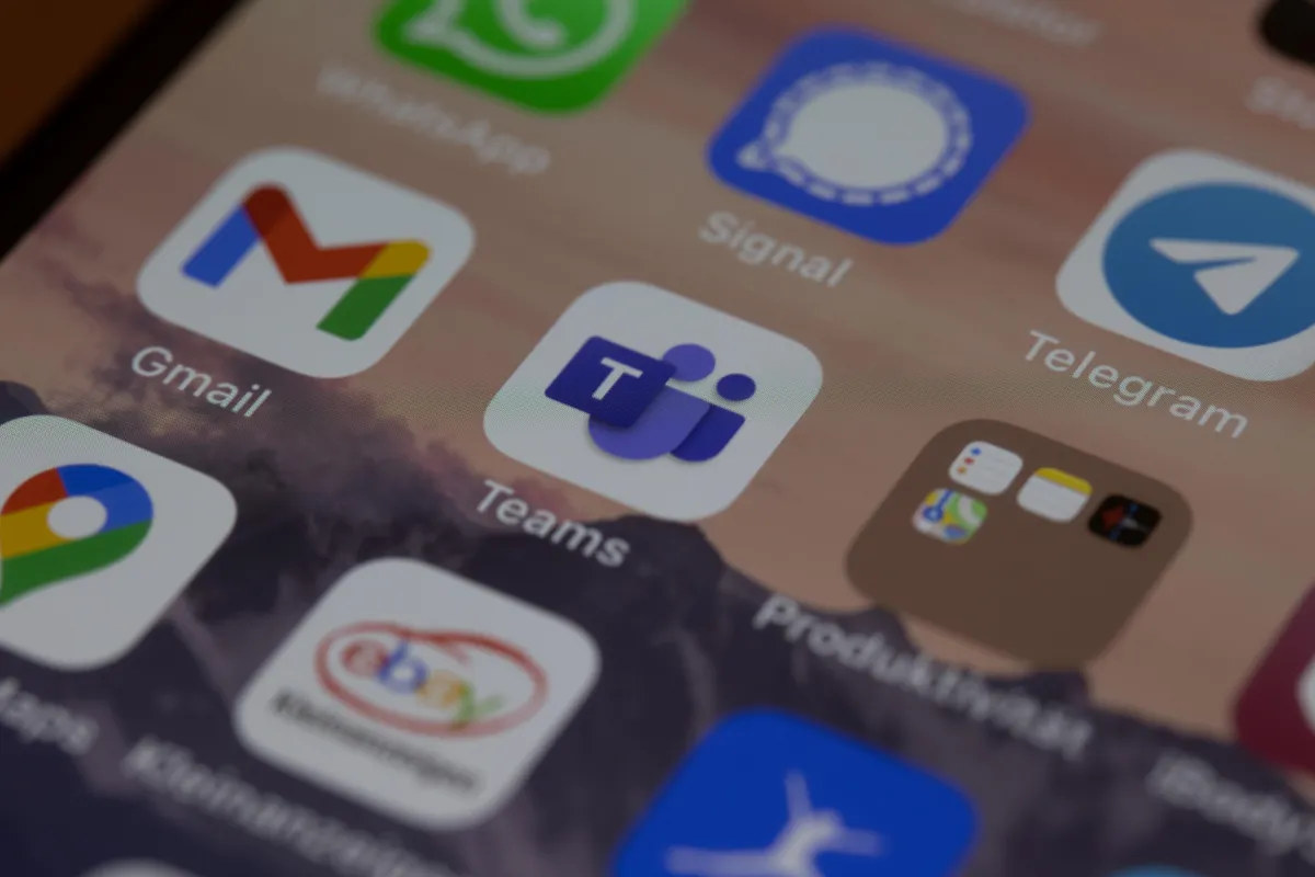 Close up image of apps on a phone with Teams in the middle.