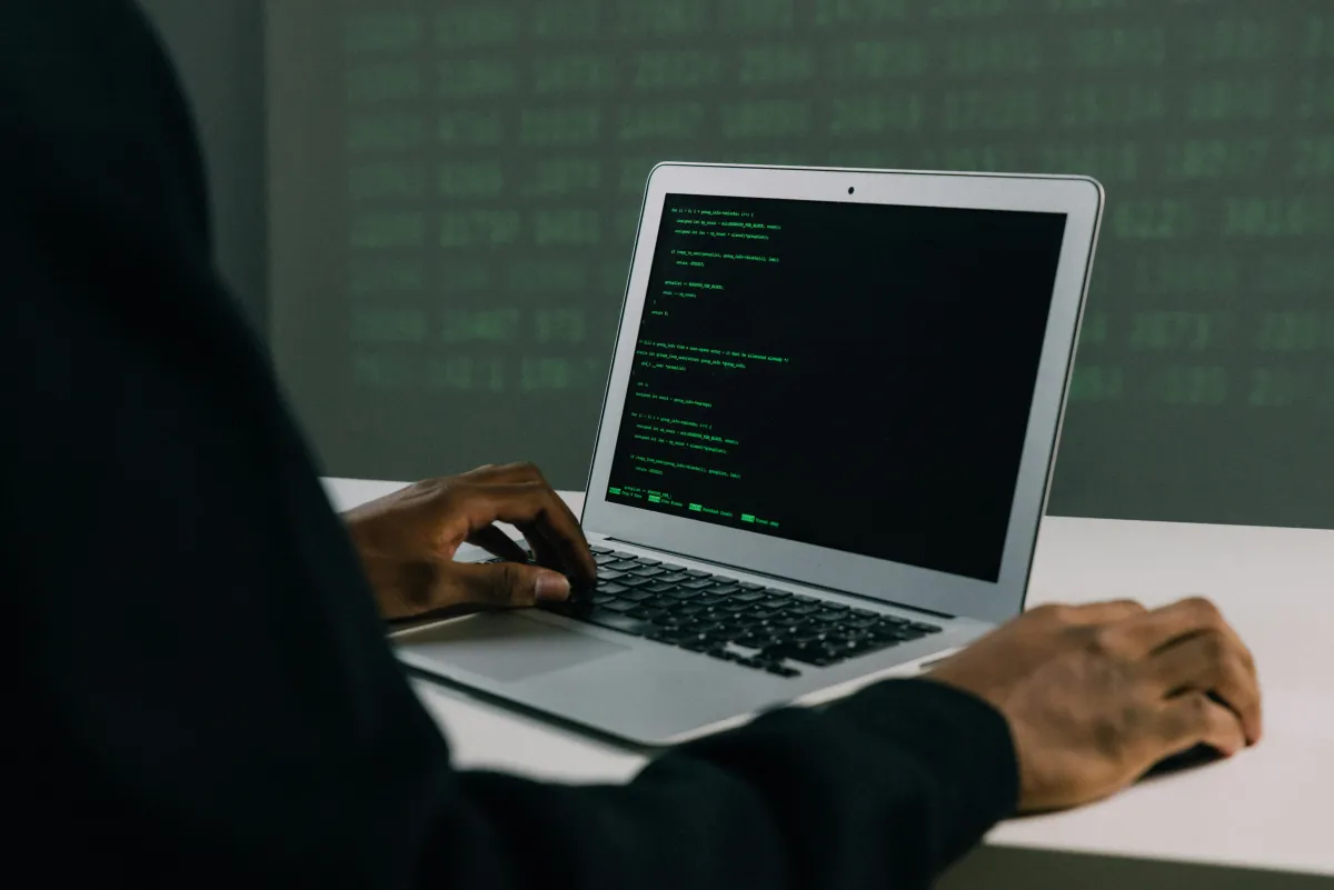 person using a laptop.