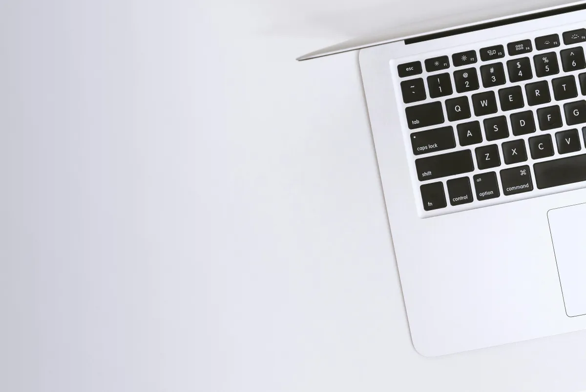 A picture of a grey Laptop from above, showing only half the keyboard and screen.