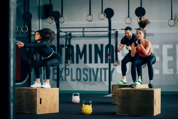 Respectful gym environment with people sharing space courteously,