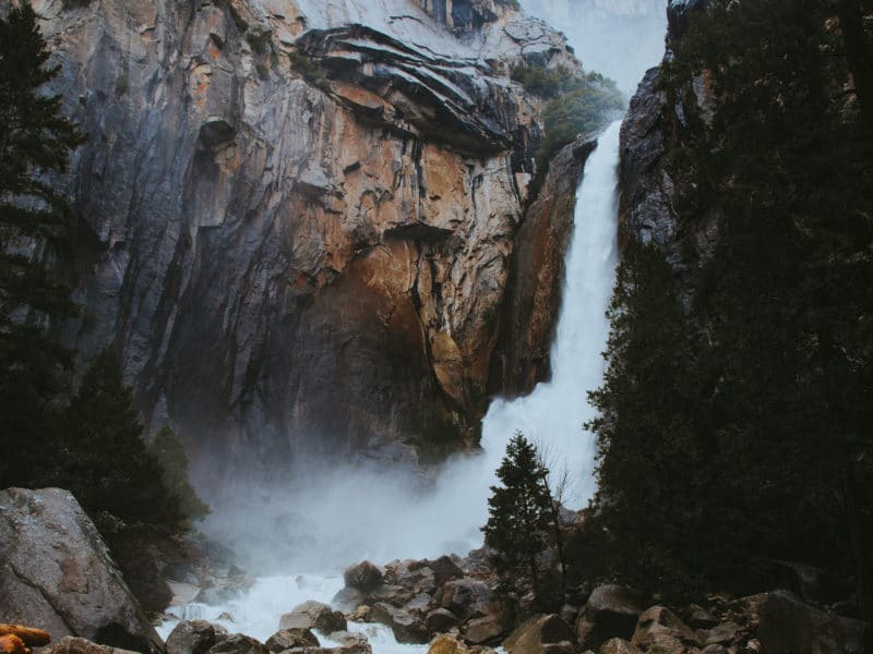 Connect to Source like a powerful waterfall embraces the rocks