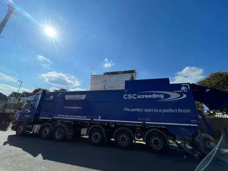 Maverick mobile screed truck by CSC Screeding operating on a live construction site.