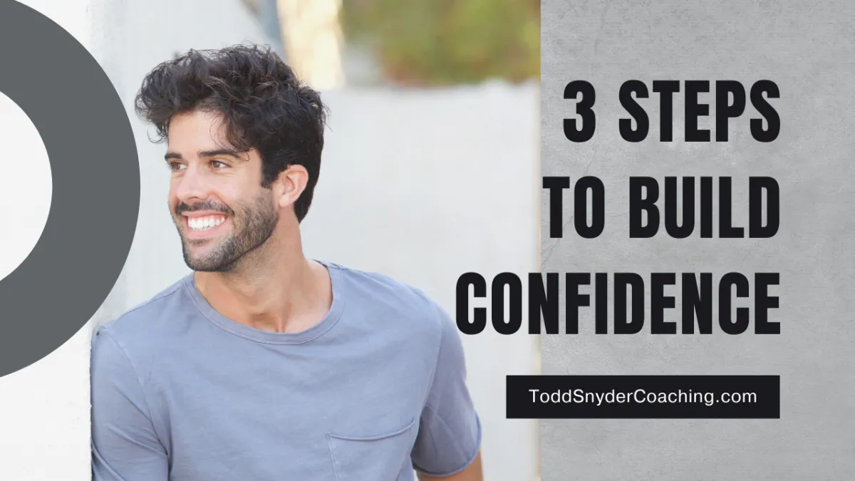 bearded man smiling confidently