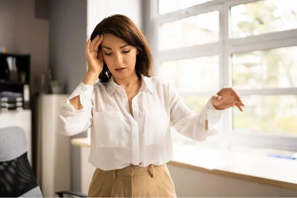 woman feeling dizzy