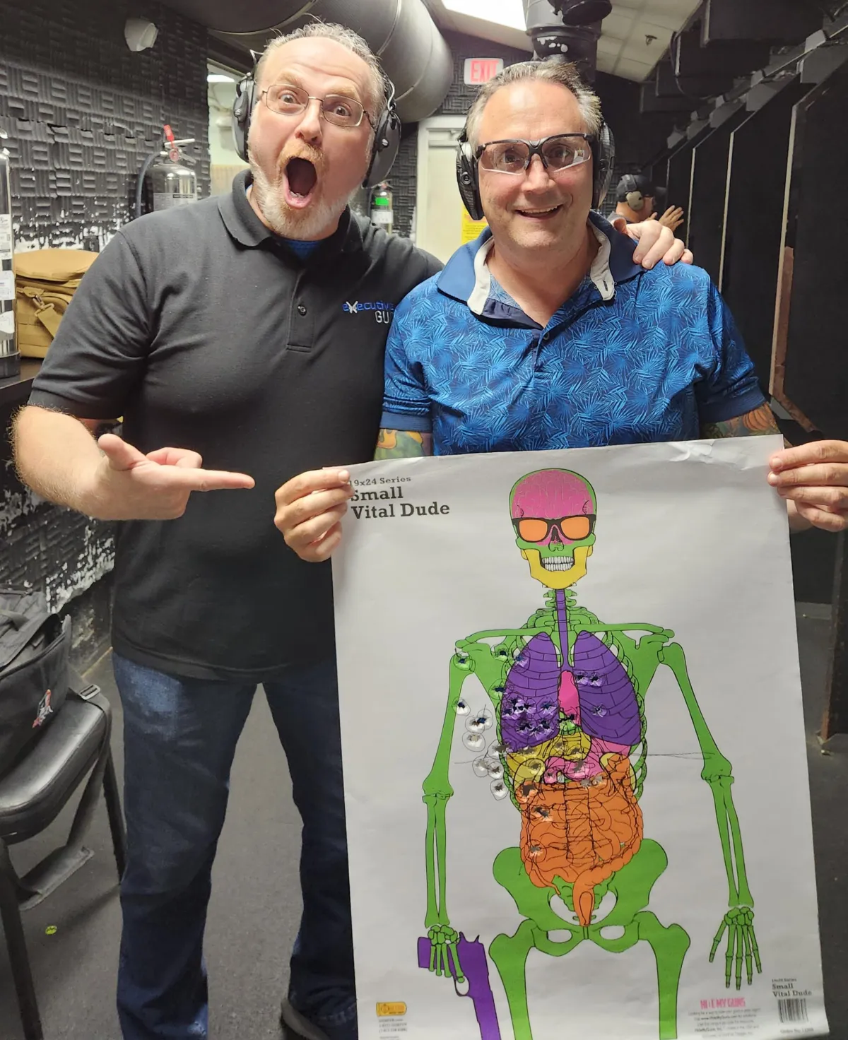 NRA Certified Instructor Joe Yagar posing with his student at the gun range