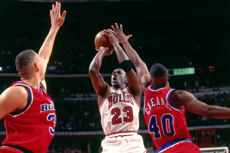 Michael Jordan attempting a shot during a basketball game