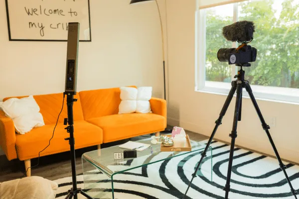 Couch and camera equipment to record content.