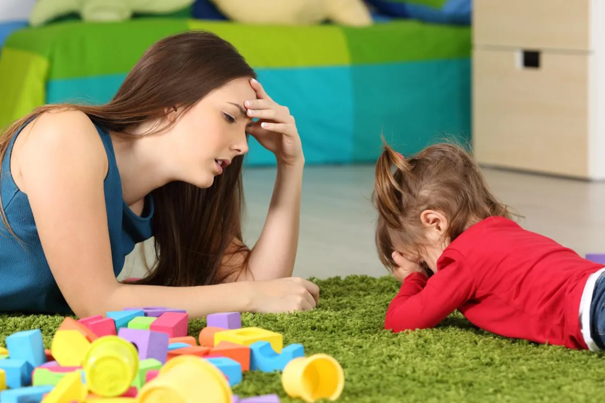 A teacher frustrated with a child's actions