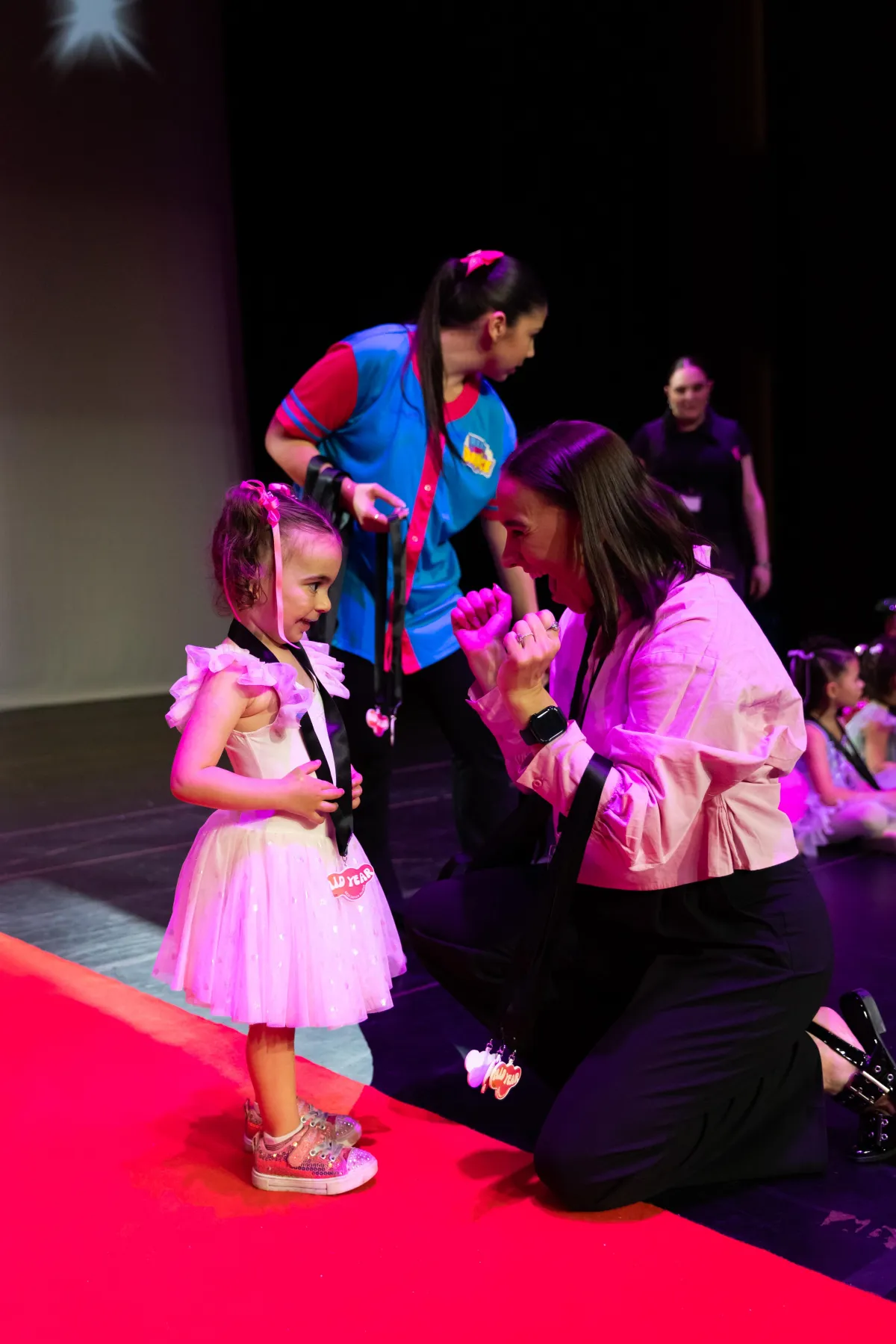 A KICO preschool dancer shines on stage, building confidence and celebrating their first concert performance.