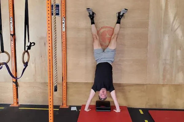 man doing ring muscle up