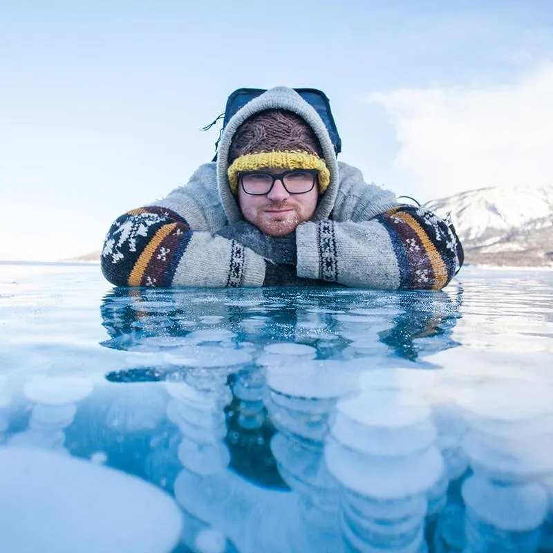 A photo of Daren Zomerman on the ice at Abraham Lake