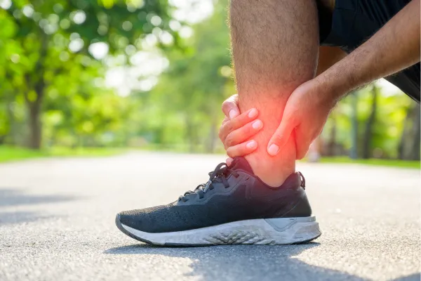 man with ankle pain