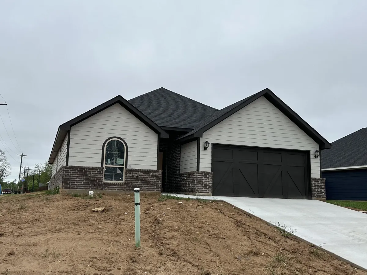 Interior rough-in stage for new construction with open layout and framing.