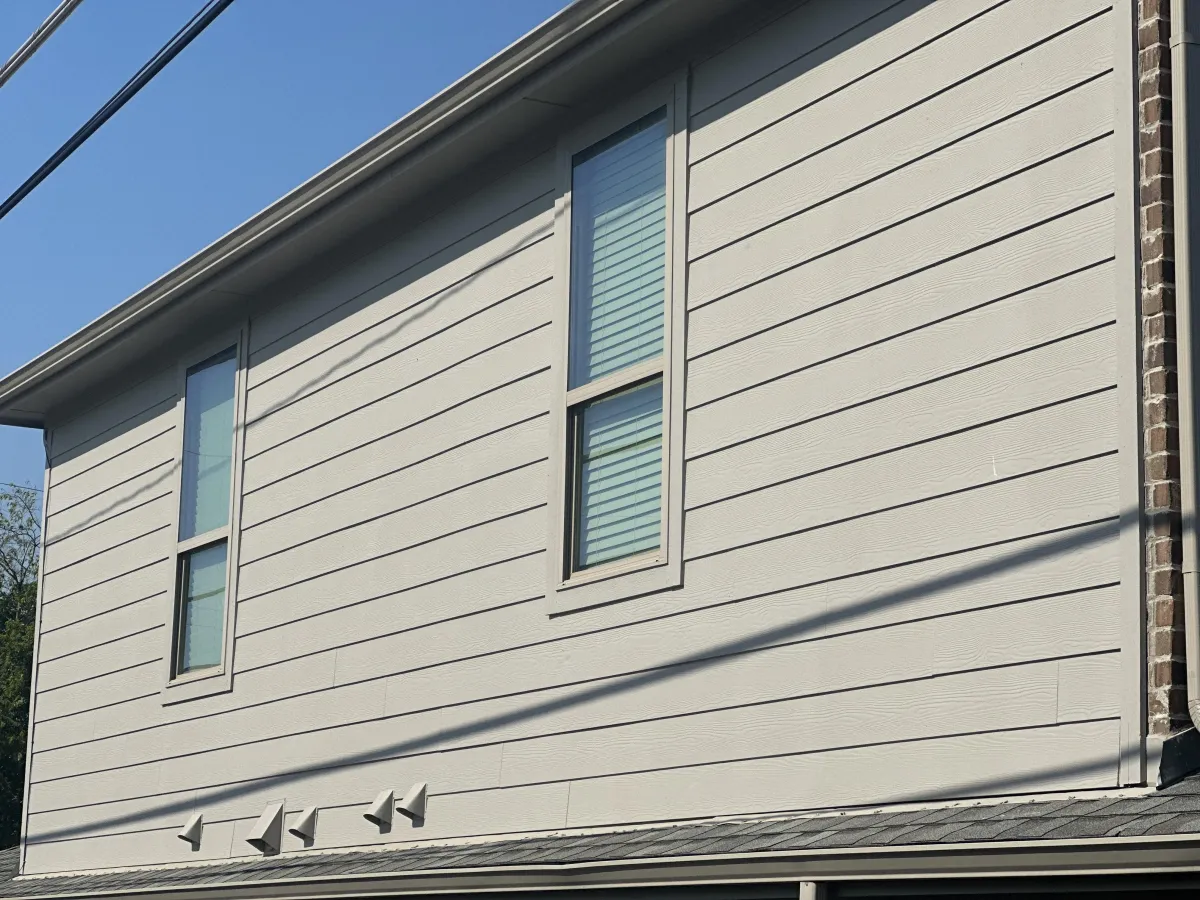 Entry area exterior trim and siding detail with clean transitions and lines